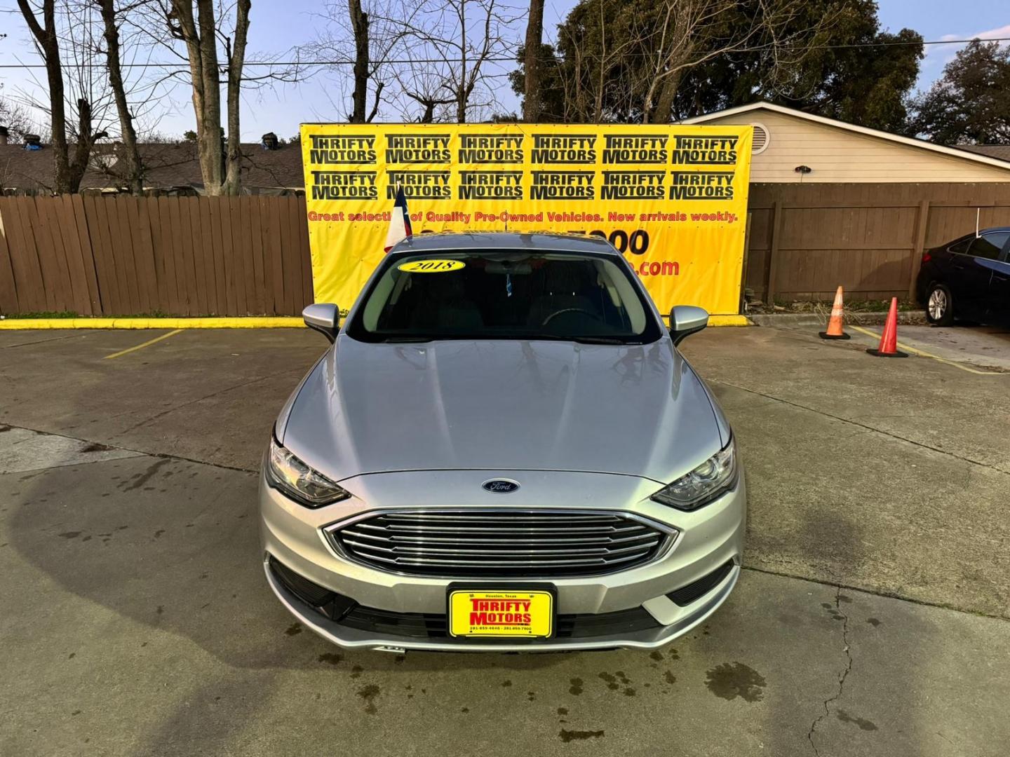 2018 Ford Fusion SE (3FA6P0HD4JR) with an 1.5L L4 DOHC 16V engine, 6A transmission, located at 16710 Clay Rd., Houston, TX, 77084, (281) 859-7900, 29.834864, -95.656166 - Photo#2